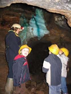 Young visitors at the Green Waterfalls in Wood Mine Young visitors at the Green Waterfalls in Wood Mine