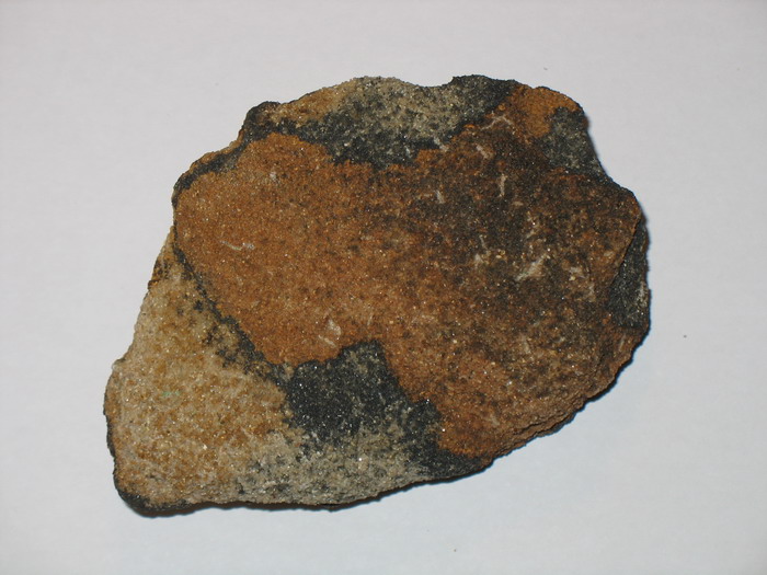 Black cobaltian wad (based on manganese oxide) in iron-rich sandstone from the Cobalt Mine Black cobaltian wad (based on manganese oxide) in iron-rich sandstone from the Cobalt Mine