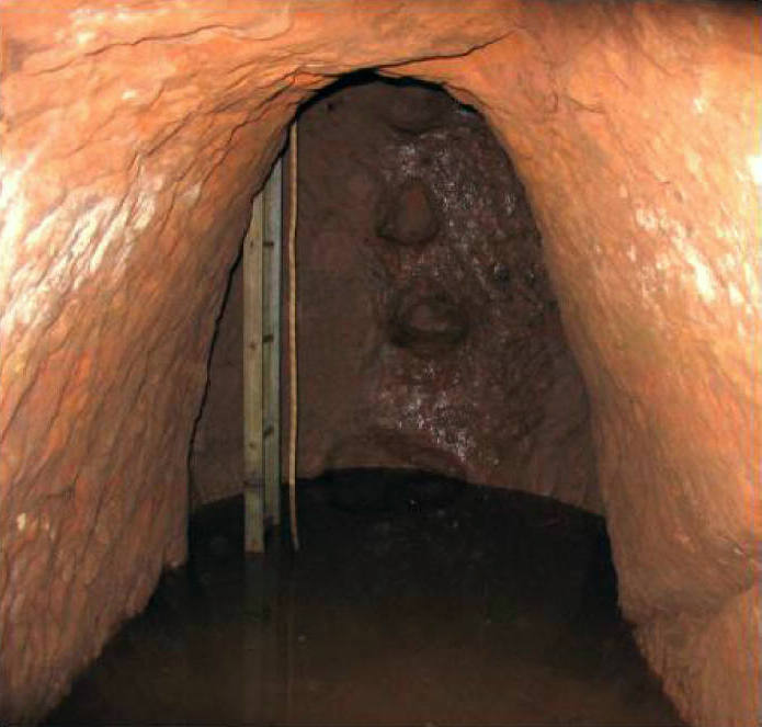 Water collecting at the bottom of the Tom's Shaft in Cobalt Mine Water collecting at the bottom of the Tom's Shaft in Cobalt Mine