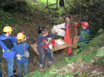 Andy handing out lights at the entrance to Wood Mine Andy handing out lights at the entrance to Wood Mine